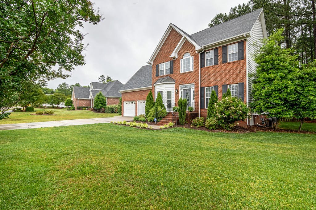 Residential House with green front lawn